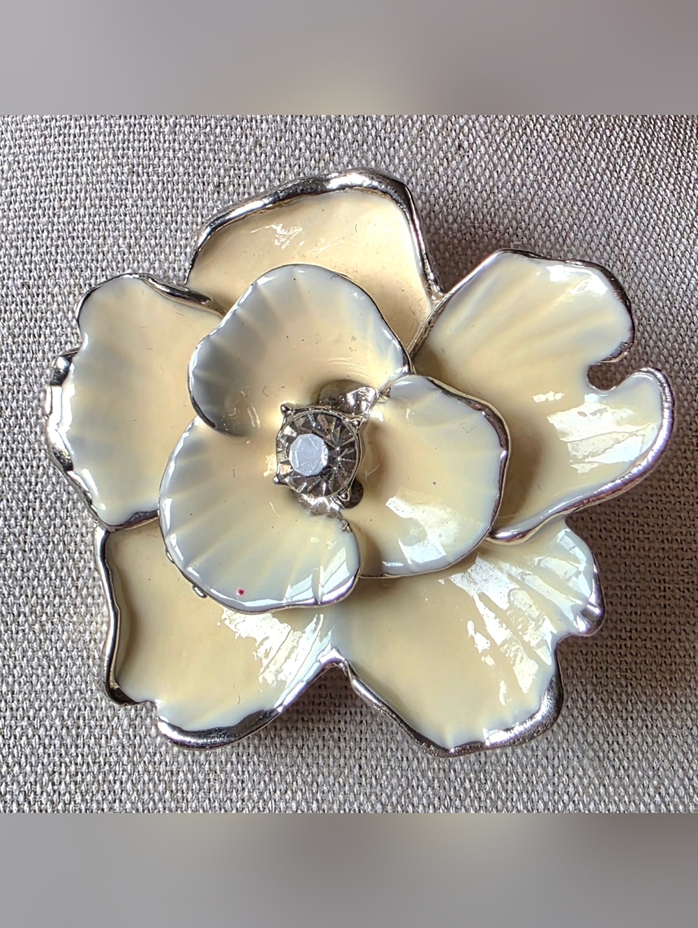 Vintage Hibiscus Flower Brooch In Ivory Trimmed In Silver With Rhinestone Center